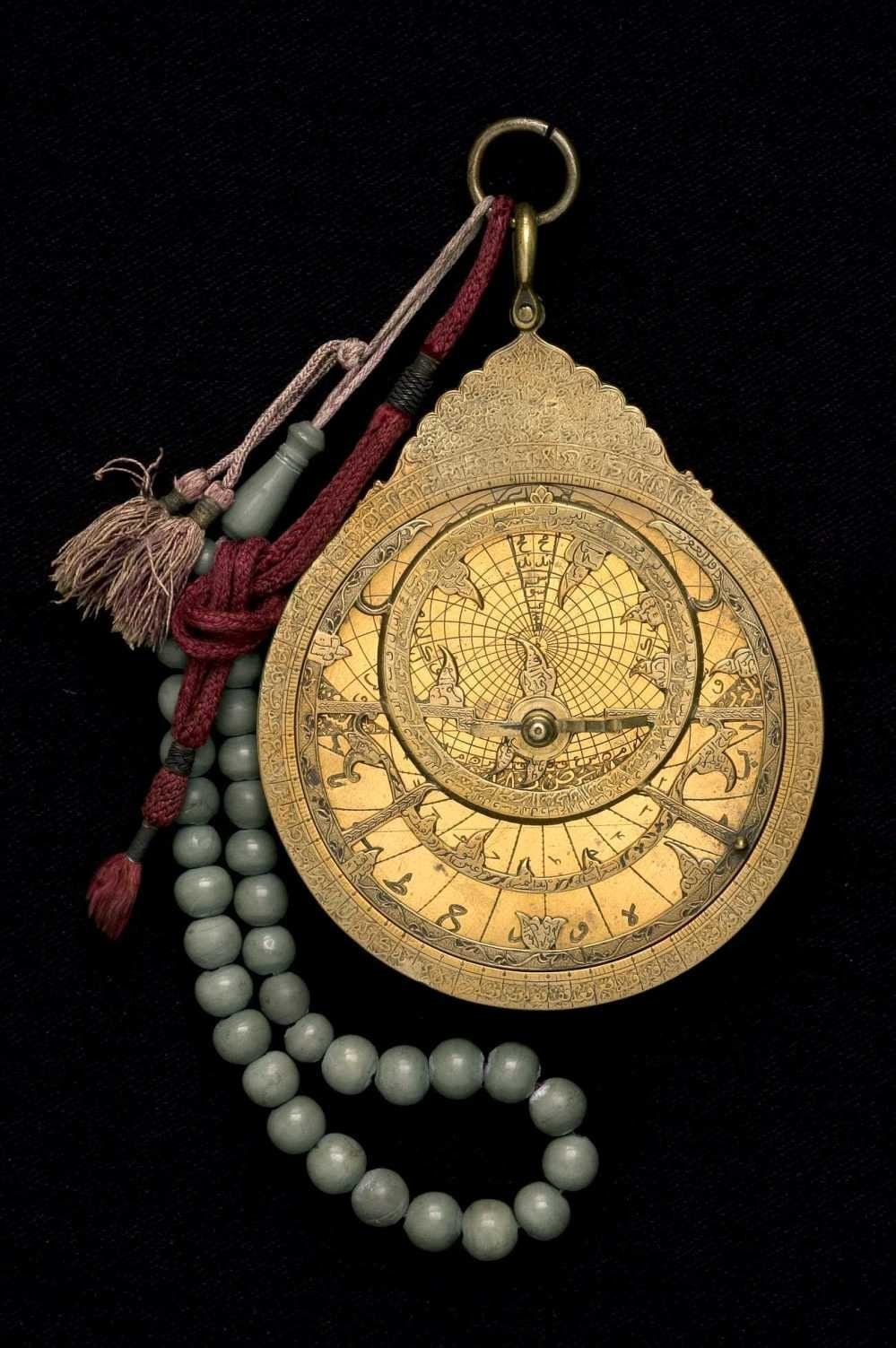 About CalculateQuick.com 1 A brass astrolabe showing intricate engravings and rotating components used for astronomical calculations